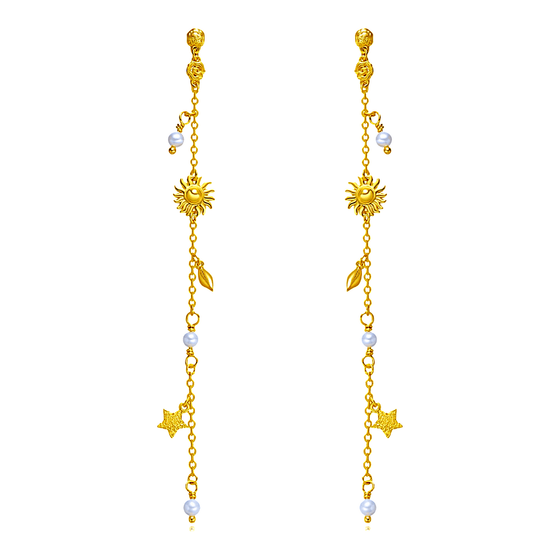 Et par lange Drømme Stjerne Øreringe fra Pallantis Smykker i forgyldt sølv med sol- og stjernevedhæng, små hvide ferskvandsperler og bladdetaljer på fine guldkæder.