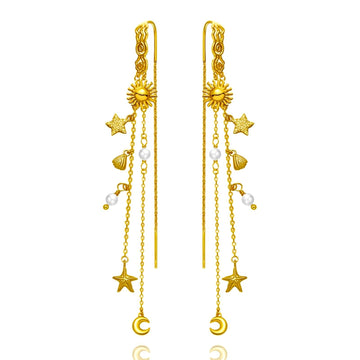 Pallantis Smykkers Ocean Dream Øreringe har guld-dangle-øreringe med sol-, stjerne-, måne-, skal- og perle charme på fine kæder i forgyldt sølv og prydet med ferskvandsperler.
